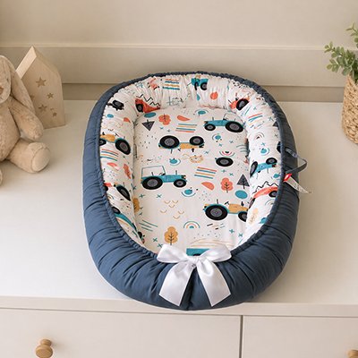 Reducteur de lit bebe